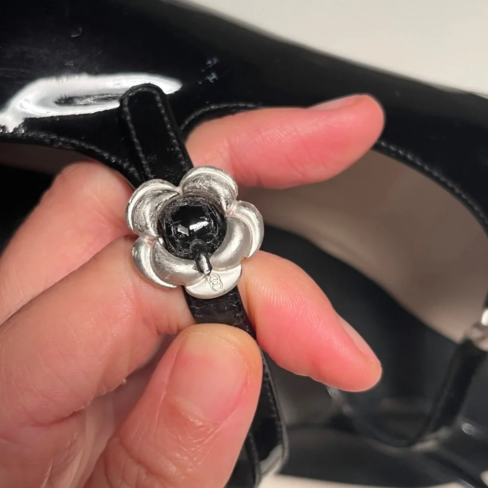 CHANEL Black Patent Leather Flats with Silver Floral Accents - Picture 10 of 14
